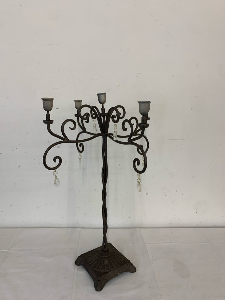 HEAVY CAST IRON TAPER CANDELABRA.