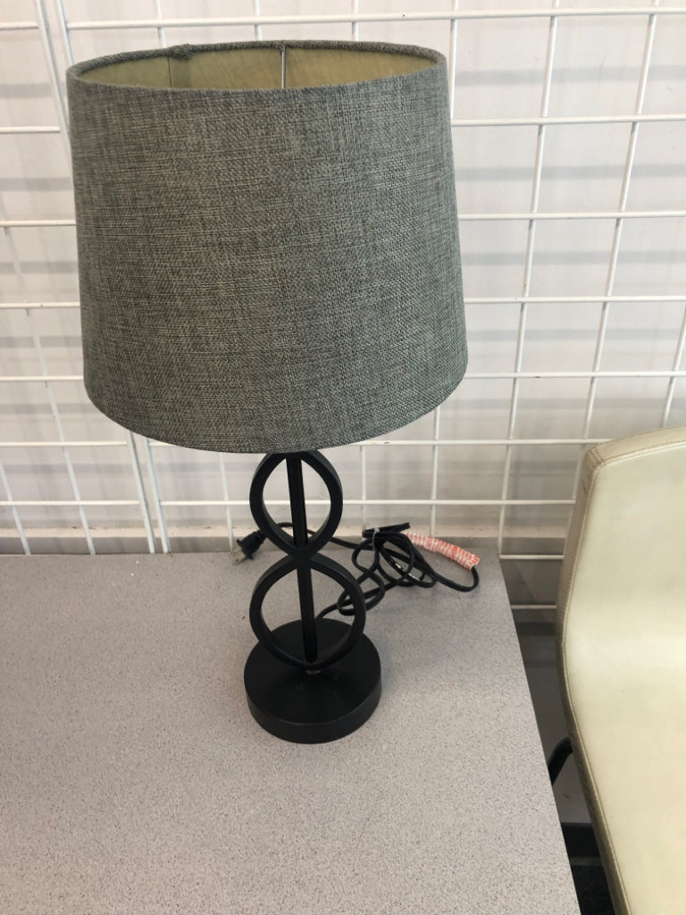 LOOP-BASE LAMP W/GRAY SHADE.