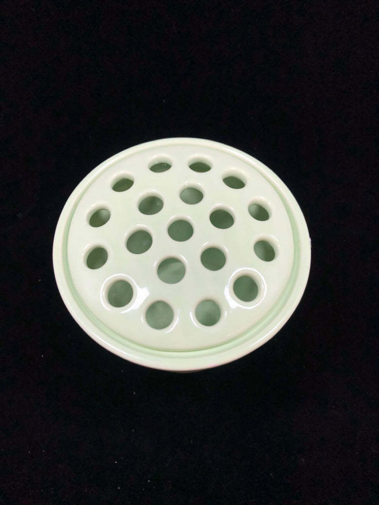 LT GREEN CERAMIC VASE W/FLOWER FROG LID.
