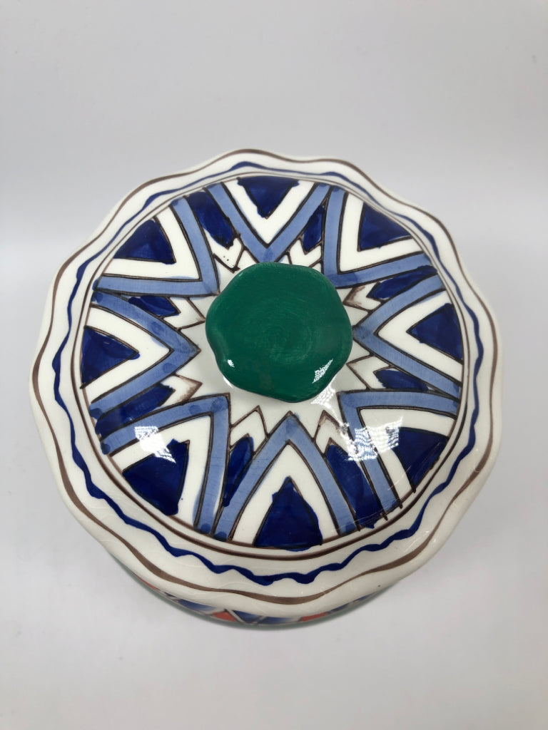 MULTI-COLORED BLUE/ YELLOW ROUNDED JAR.