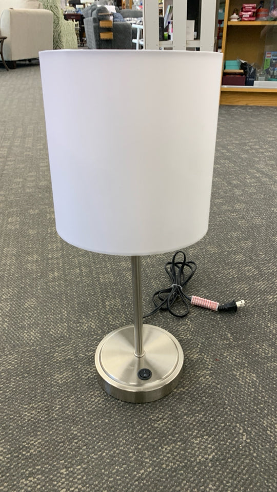 SILVER BASE LAMP W/WHITE SHADE.