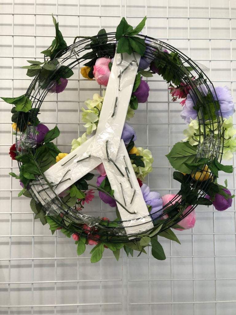 FAUX FLORAL PEACE SIGN WREATH.