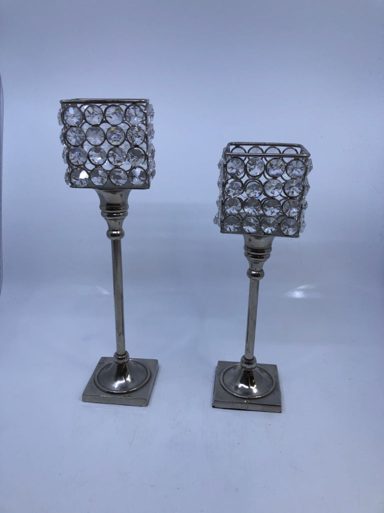 2 BEJEWELED CANDLE HOLDERS.