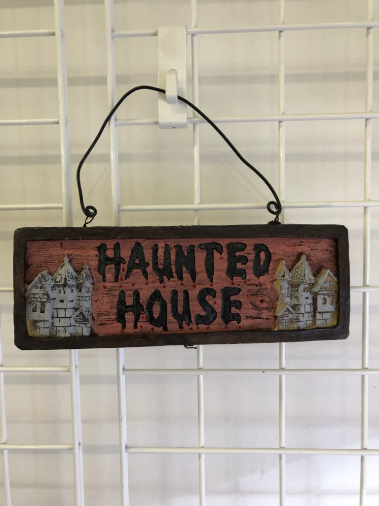 RESIN HAUNTED HOUSE EMBOSSED HOUSE WALL HANGING.
