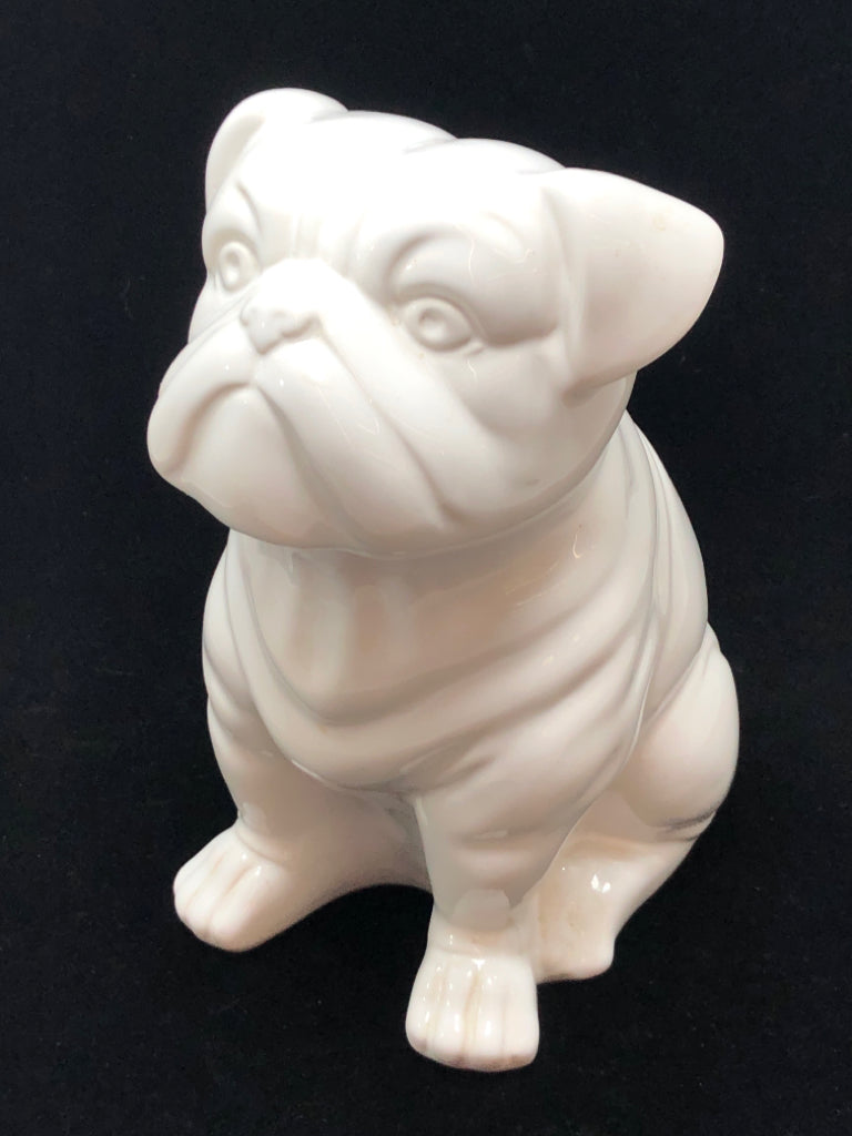 WHITE CERAMIC DOG FIGURINE.