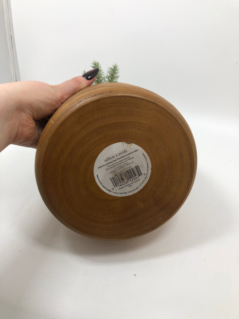 FAUX GREENERY IN WOOD POT.