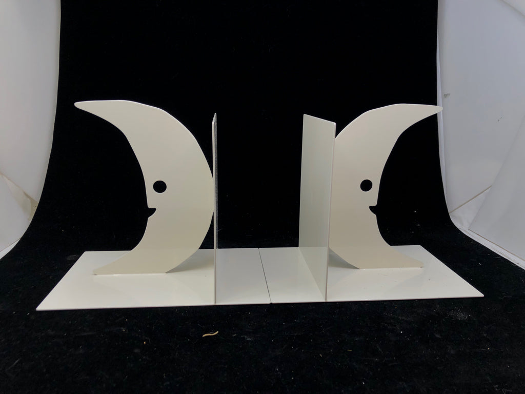 2 WHITE METAL HALF MOON BOOK ENDS.