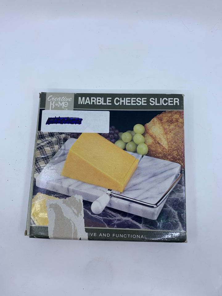 NIB MARBLE CHEESE SLICER.