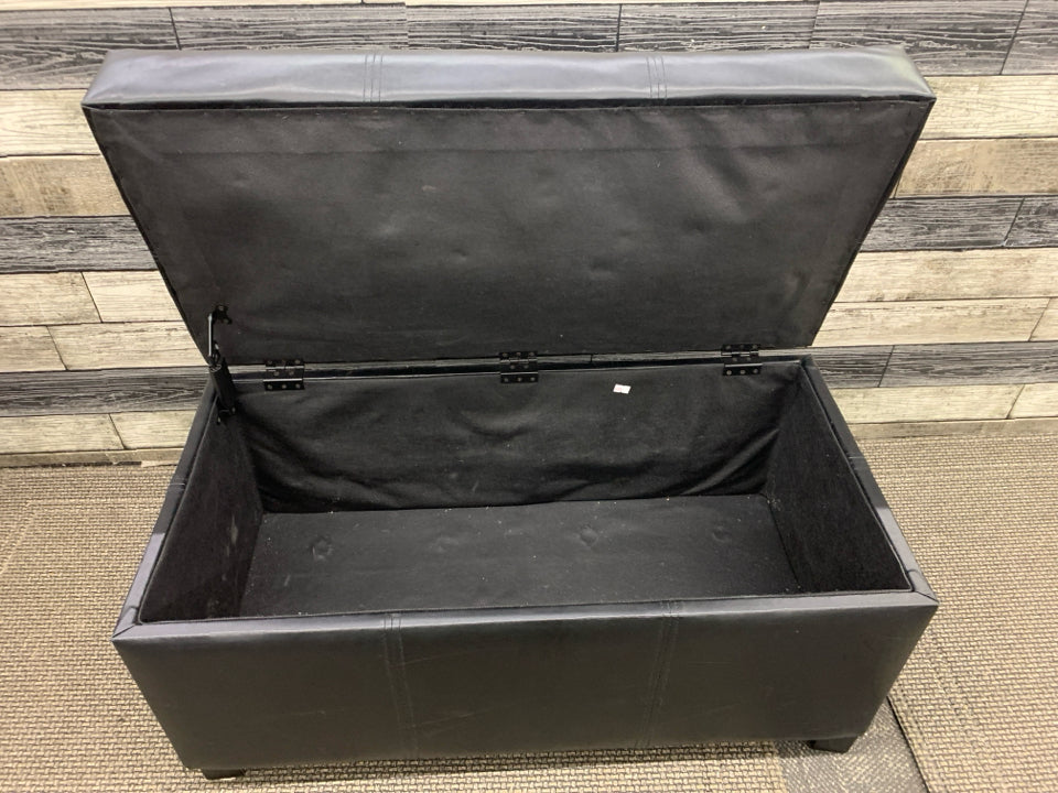 FAUX BLACK LEATHER BENCH W/ FLIP TOP STORAGE.