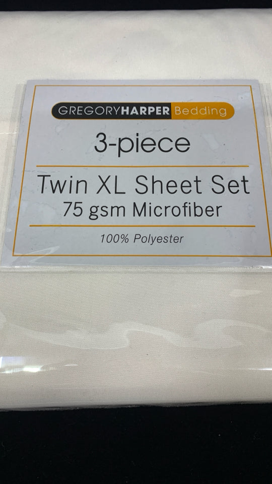NIP TWIN XL CREAM SHEET SET.