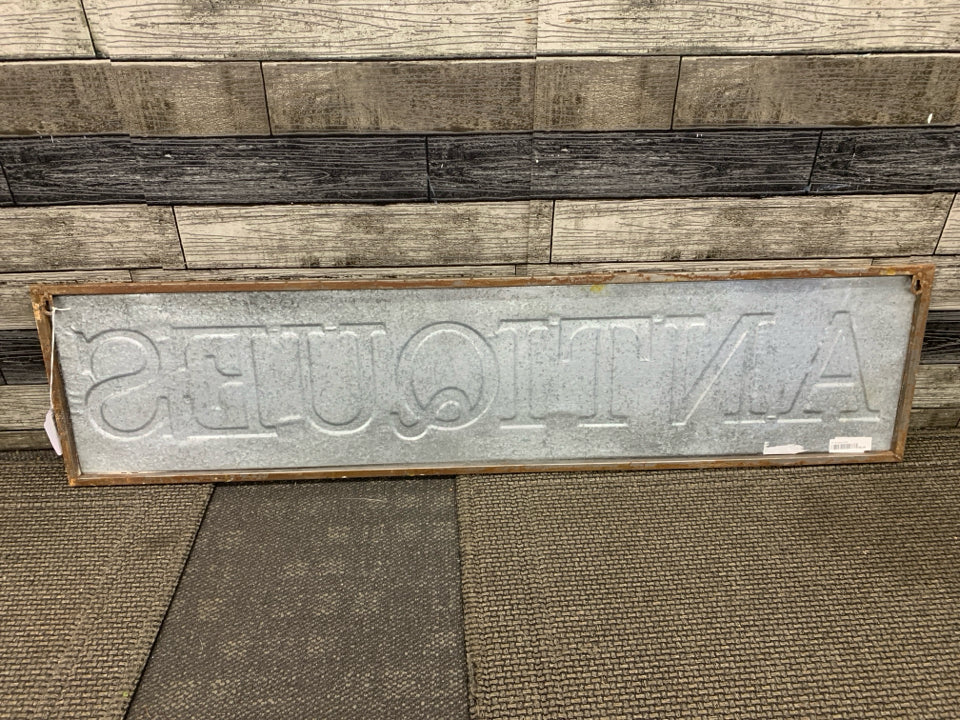 "ANTIQUES" METAL SIGN.