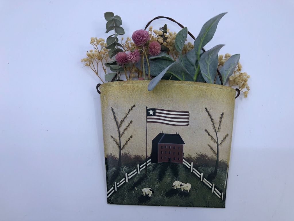 SMALL METAL WALL POCKET W/ PRIMITIVE HOUSE+SHEEP FAUX FLORAL BOUQUET.