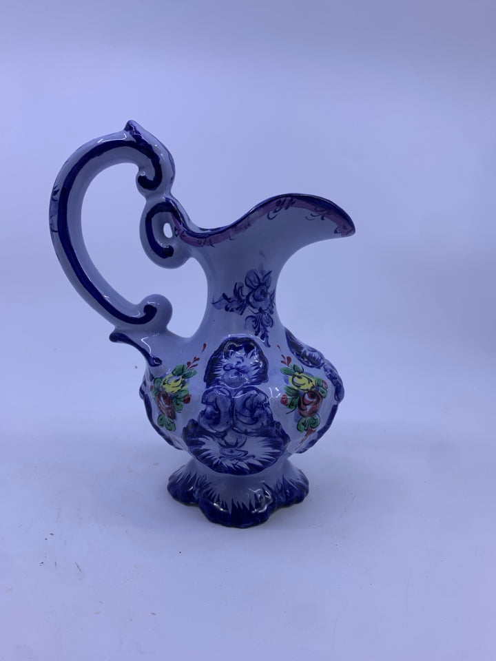 PALE BLUE FLORAL PAINTED PITCHER VASE.