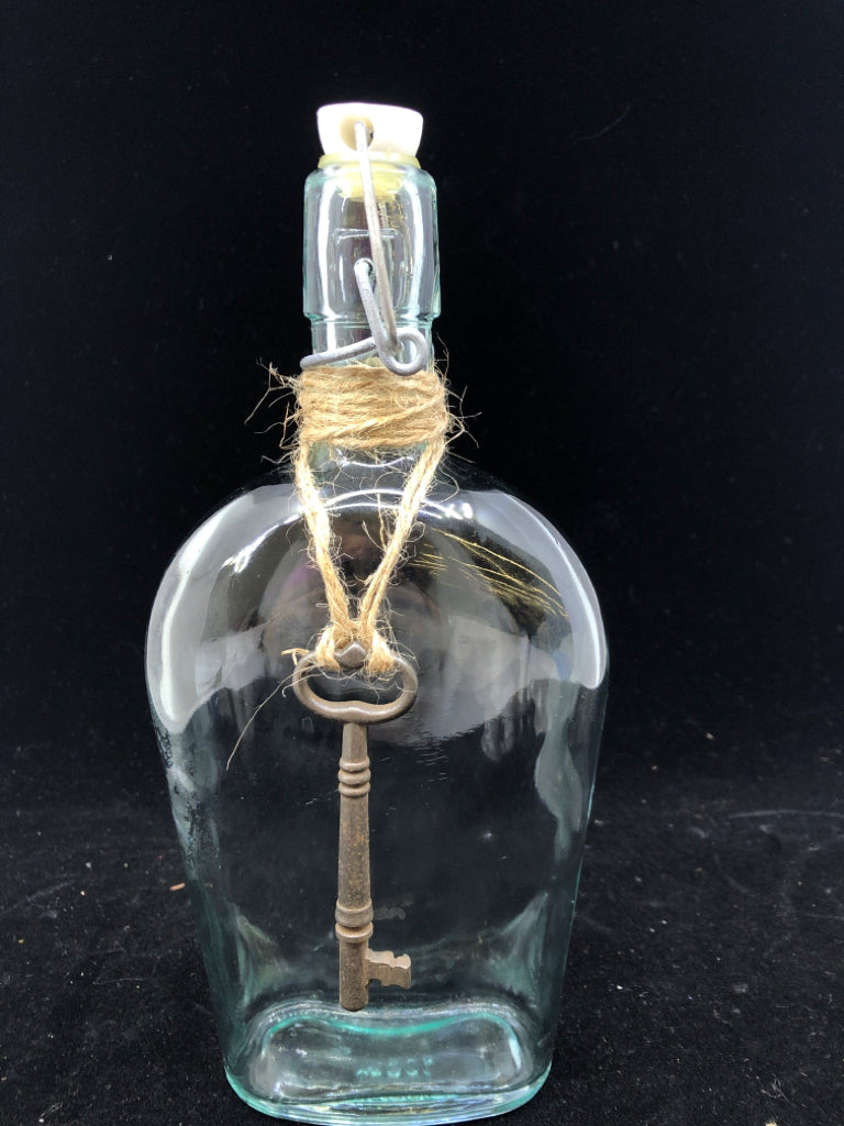 WIDE JAR W KEY AND METAL CLASP.
