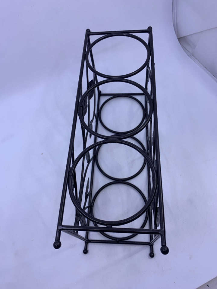 SMALL 3 SECTION LEAF PATTERN WINE RACK.