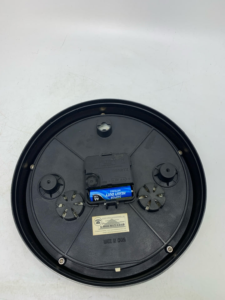 PLASTIC CLOCK W/ TEMP & HUMIDITY.