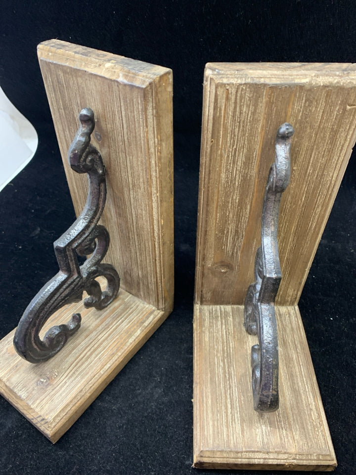 2 DARK WOOD BOOKENDS W/ METAL SCROLL.