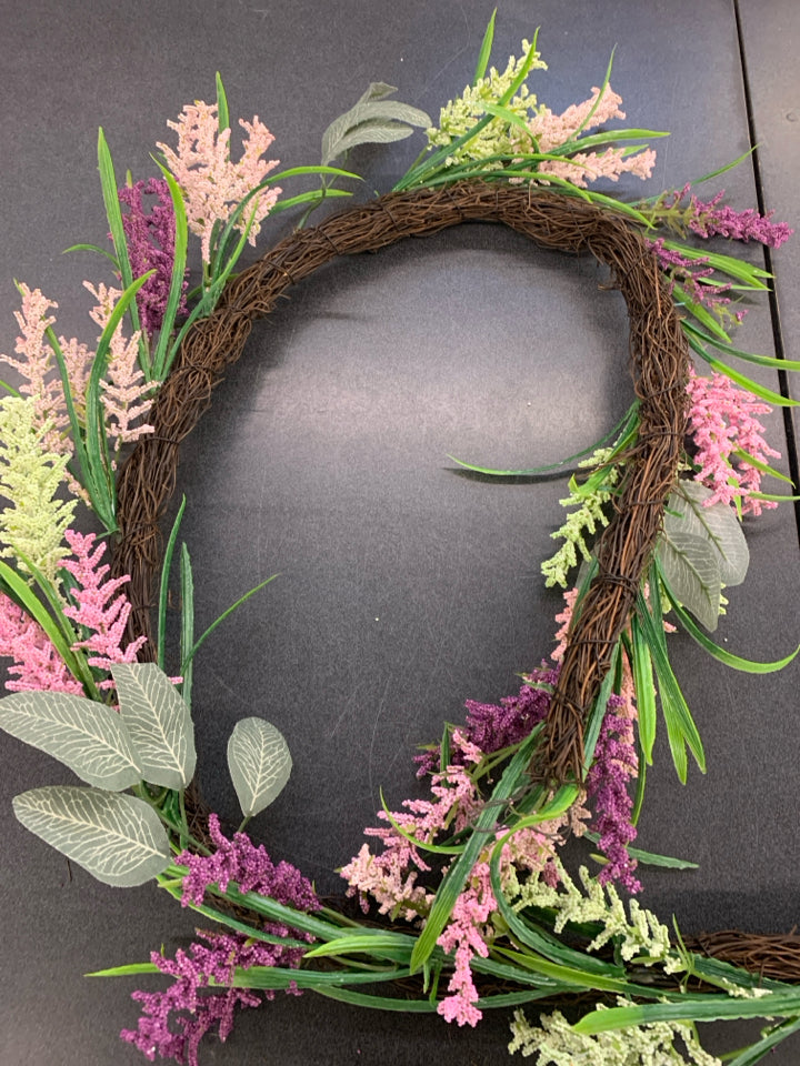 PINK/PURPLE FLORAL GARLAND.