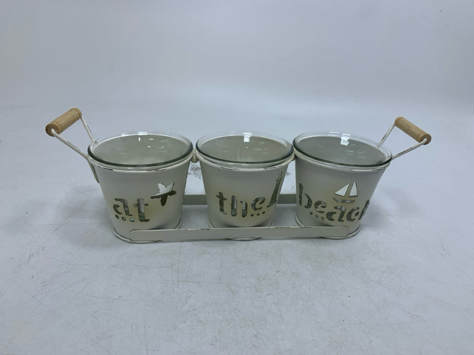 METAL AT THE BEACH TEALIGHT HOLDER.