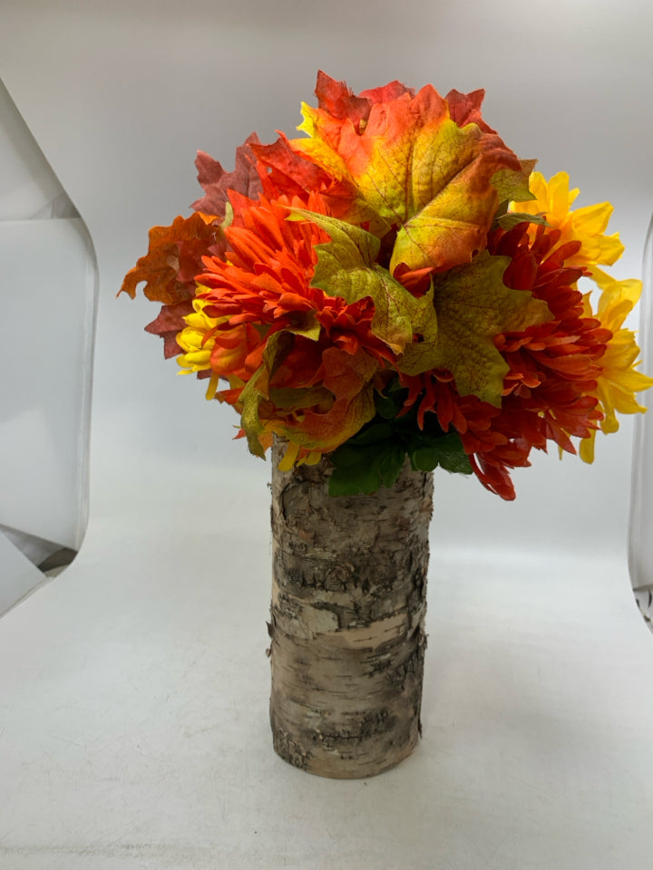 BARK WRAPPED VASE W/ FALL COLORED FLOWERS.