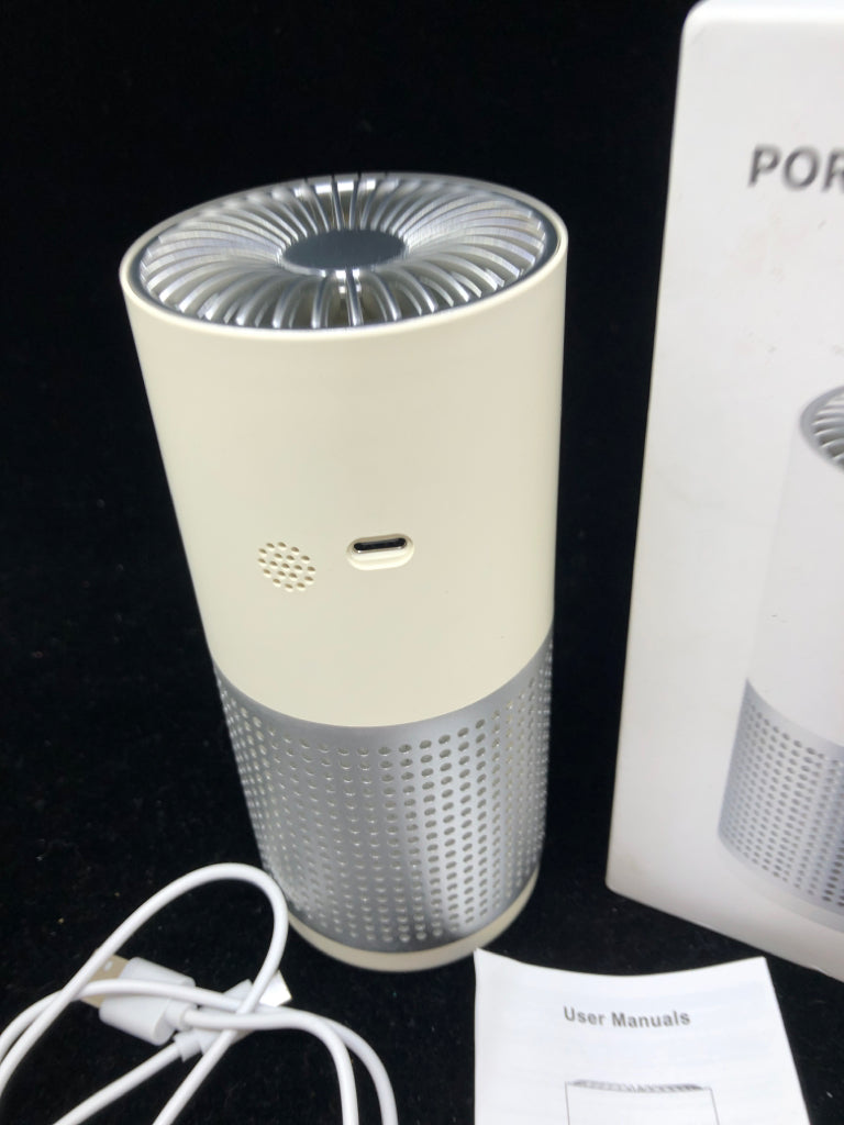 NIB PORTABLE AIR PURIFIER.
