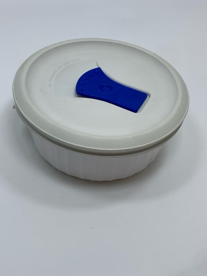 COVERED CORNING WARE DISH.