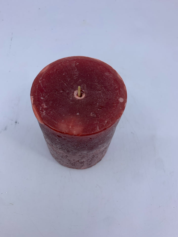 RED PILLAR CANDLE.