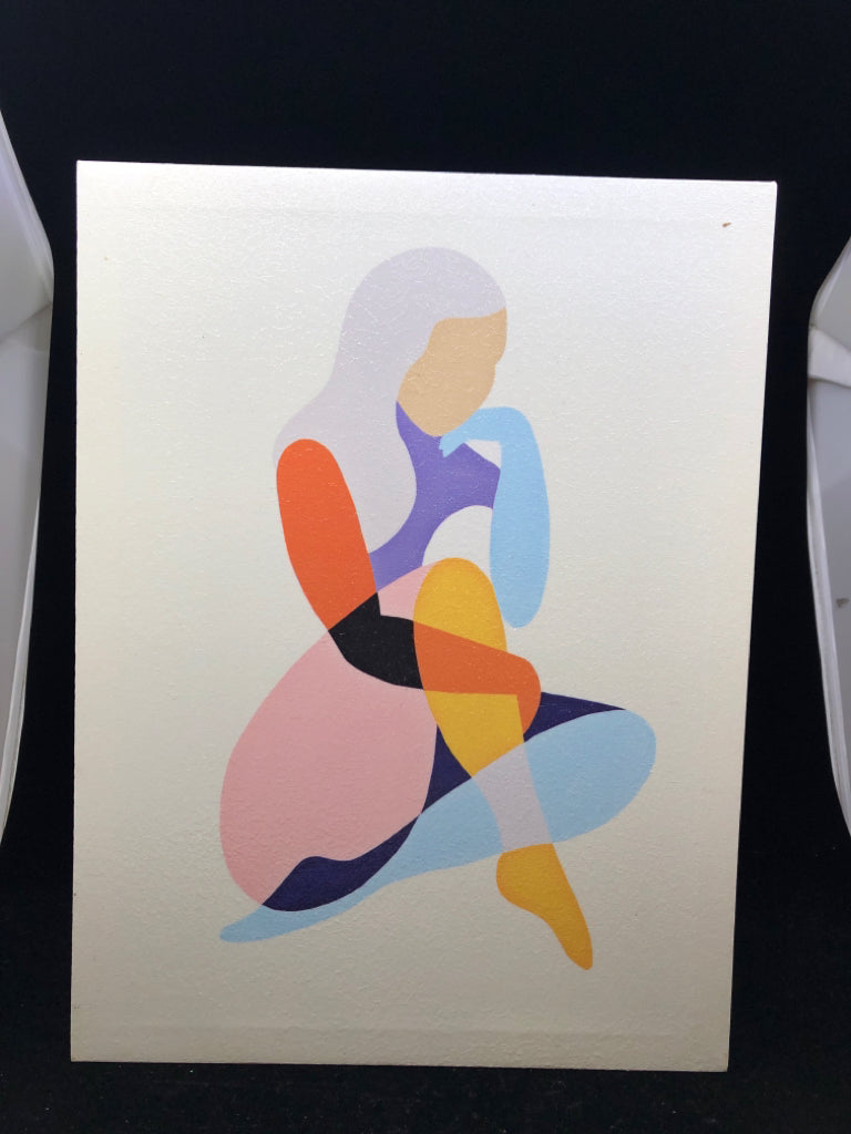 COLORFUL GIRL SITTING CANVAS WALL ART.