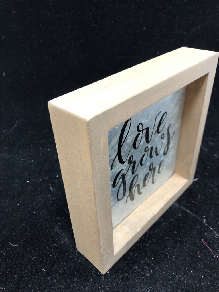 SMALL LOVE GROWS HERE GALVANIZED SIGN.