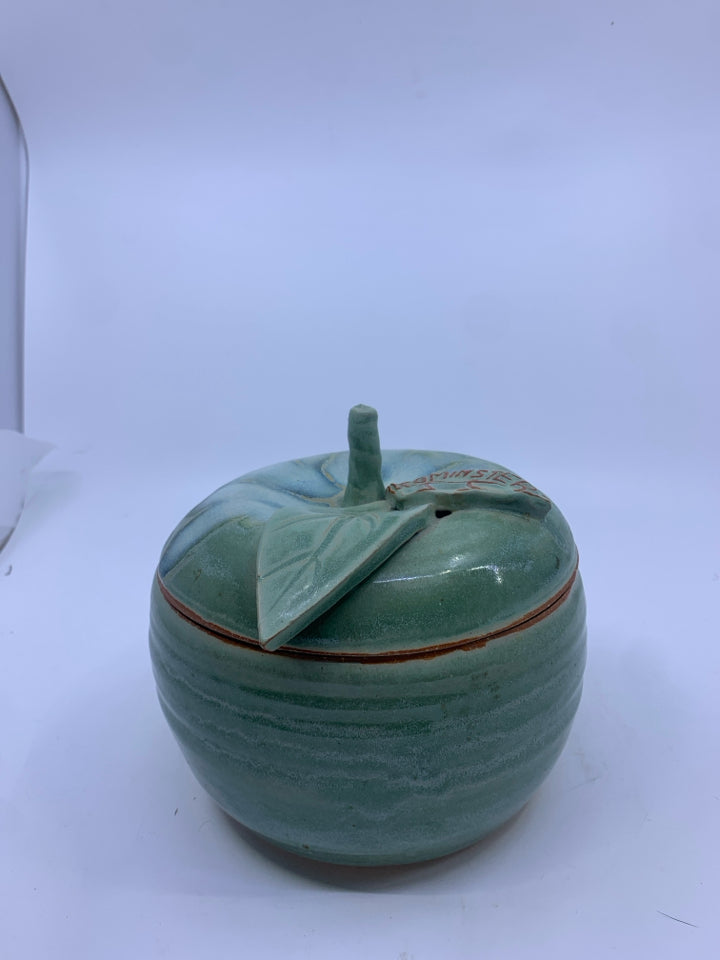 APPLE SHAPED POTTERY CANISTER W/ LEOMINSTER CARVED INTO LEAF.