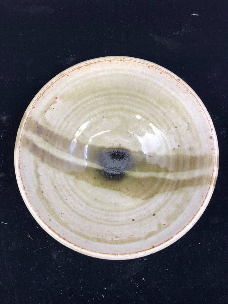 GREEN TINTED GLASS BOWL W BLACK/DARK CENTER.