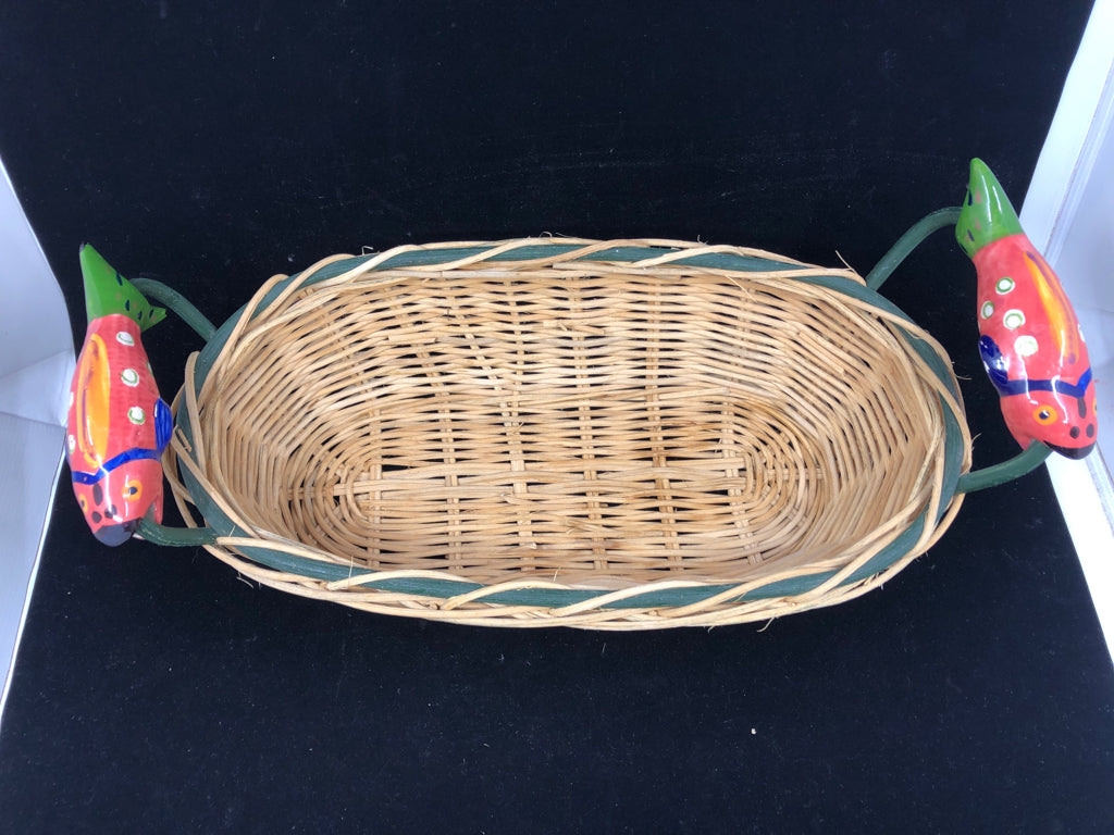 OVAL BLONDE BASKET W/ GREEN TRIM CERAMIC SALMON HANDLES.