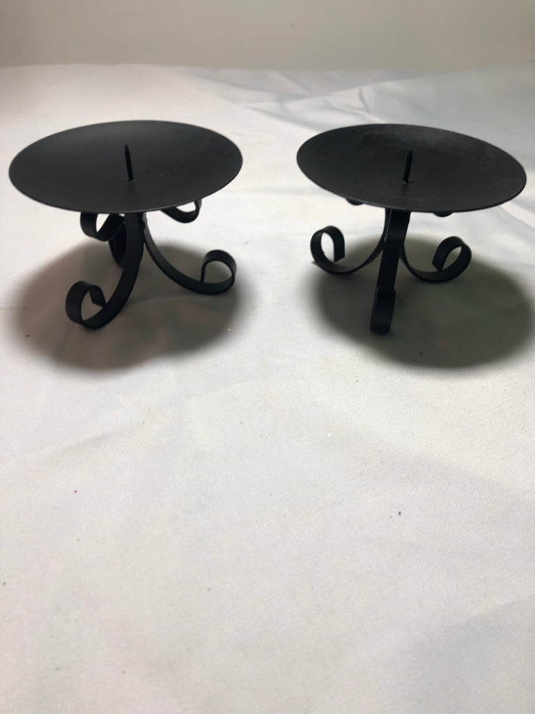 2 METAL SCROLL CANDLE HOLDERS.