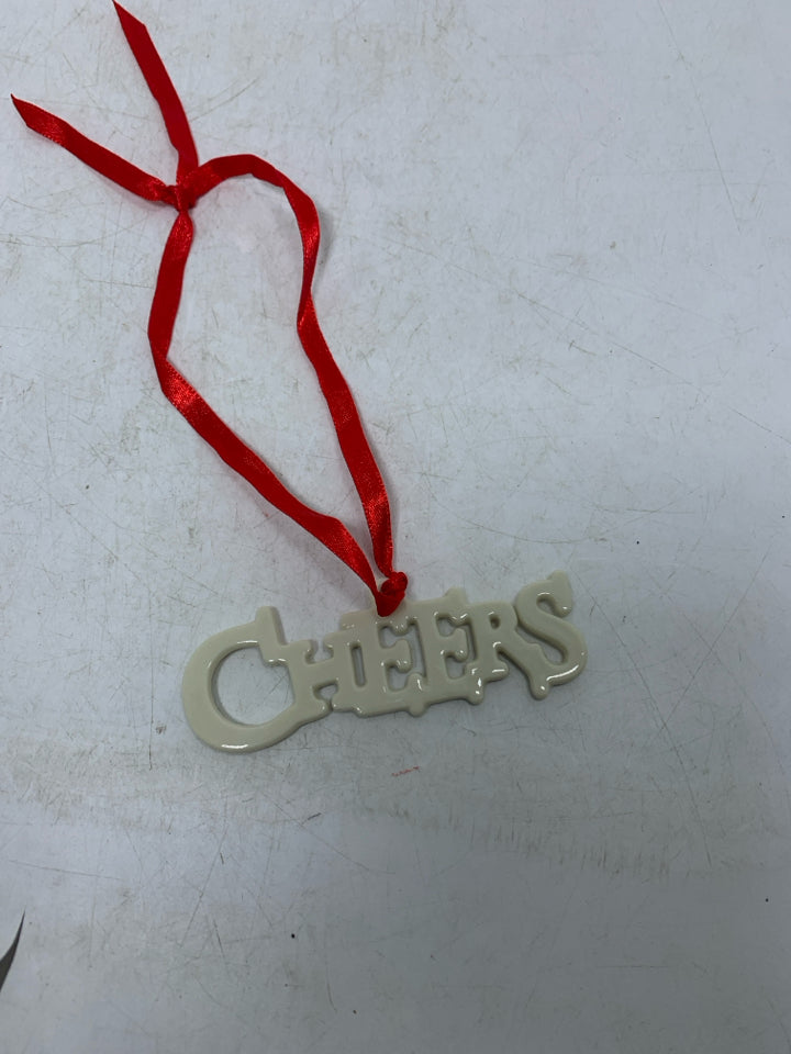 IVORY LENOX CHEERS ORNAMENT.