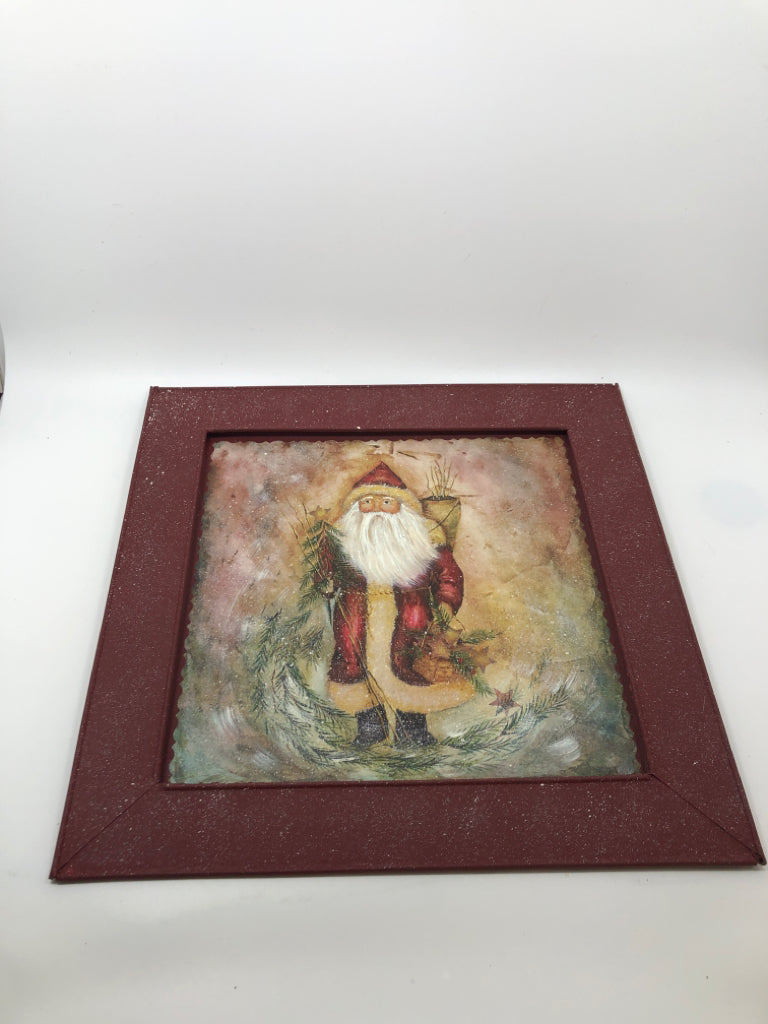 PAINTED SANTA ON METAL FRAME WALL HANGING.