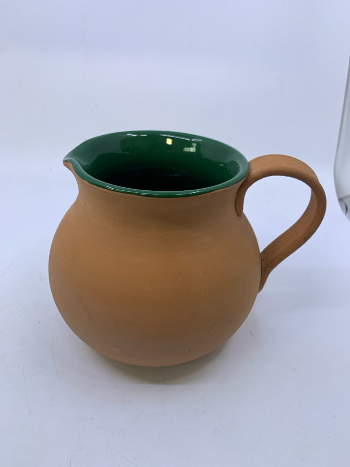 MATTER TERRA COTTA PITCHER W/ DARK GREEN GLAZED INSIDE.