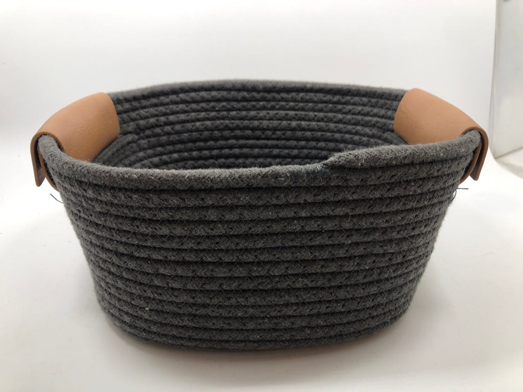 DK GREY FABRIC BIN W/FAUX LEATHER HANDLES.