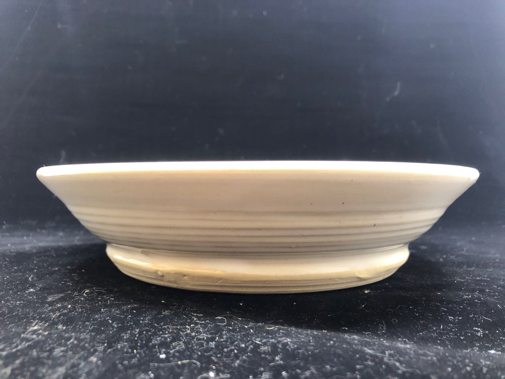 CREAM POTTERY GLAZED PIE DISH.