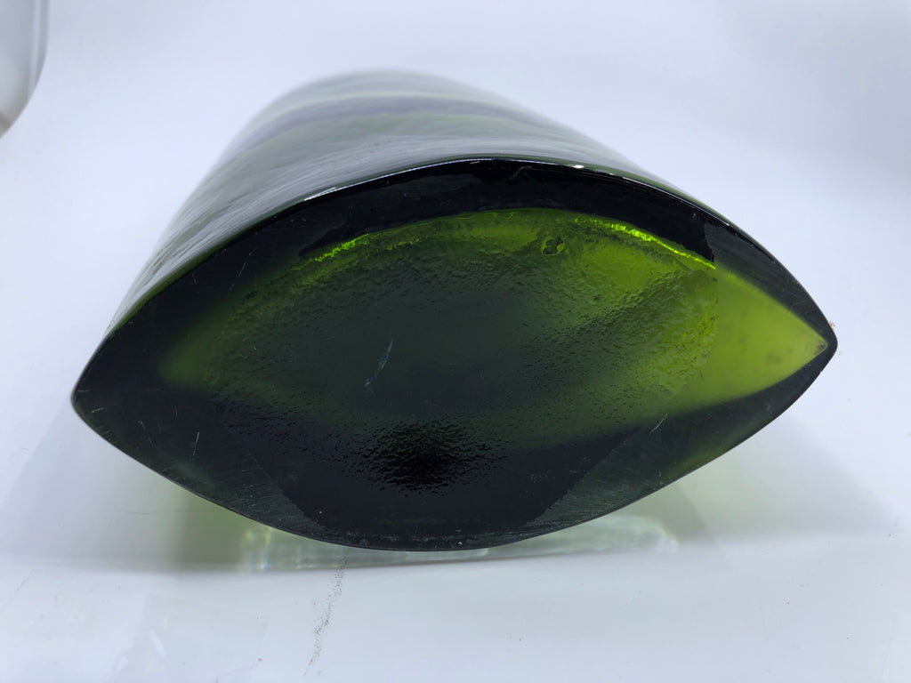 HEAVY OVAL BLOWN GLASS DARK GREEN W/ WHITE LINES.