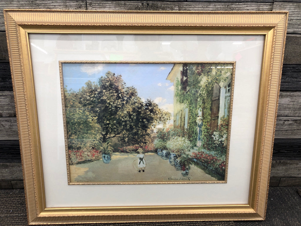 LITTLE KID IN GARDEN- MONET FRAMED PRINT.