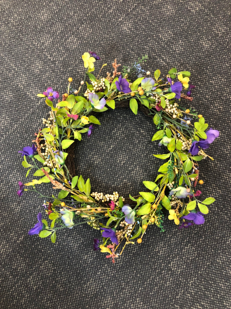 YELLOW AND PURPLE FAUX FLOWER WREATH.