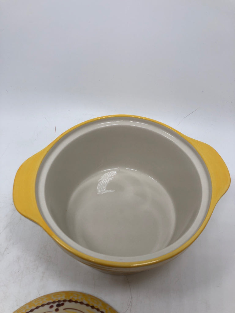 TEMPTATIONS YELLOW COVERED OLD WORLD DISH.