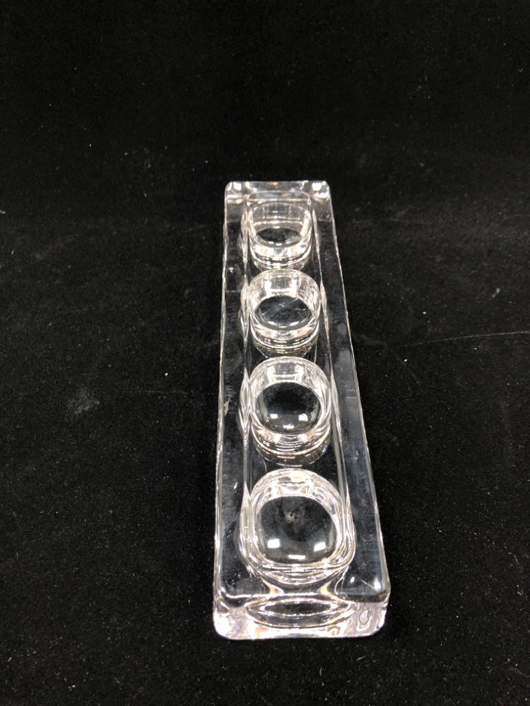 CLEAR GLASS VOTIVE HOLDER.