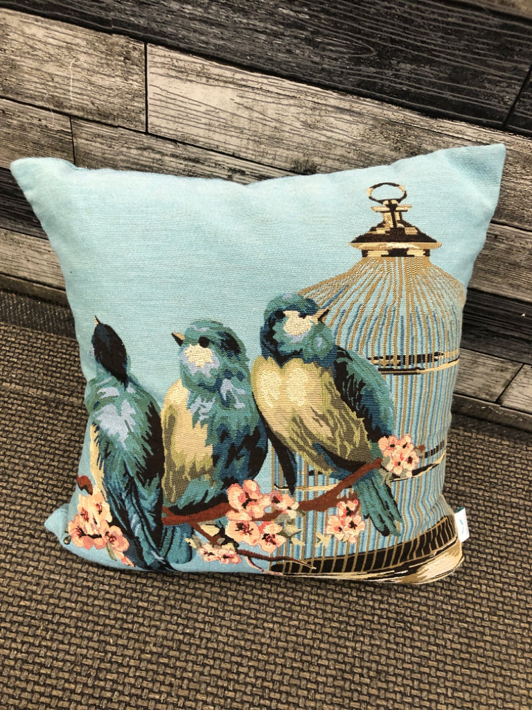 STITCHED BLUE BIRD PILLOW.