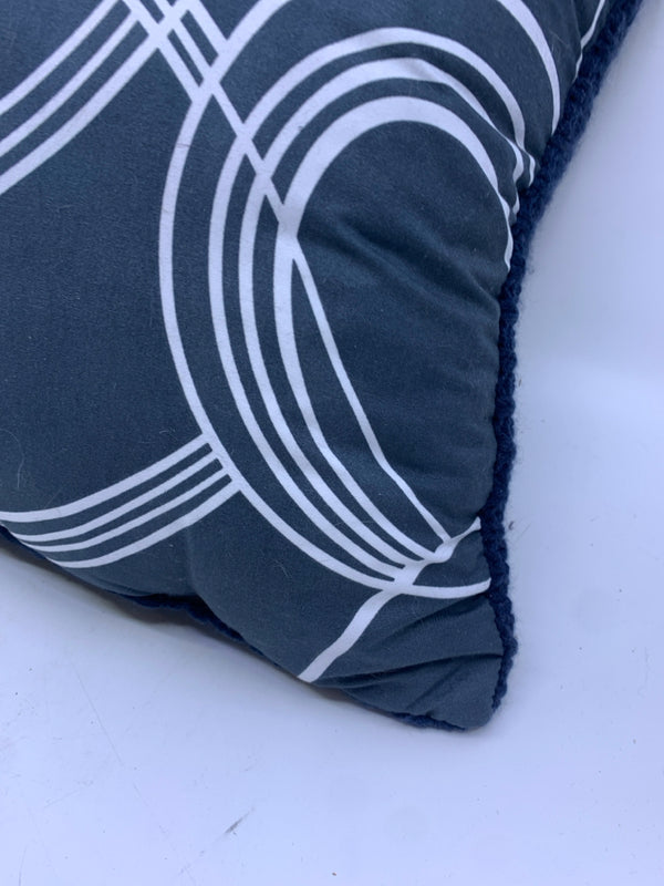 BLUE AND WHITE SCROLL PILLOW.