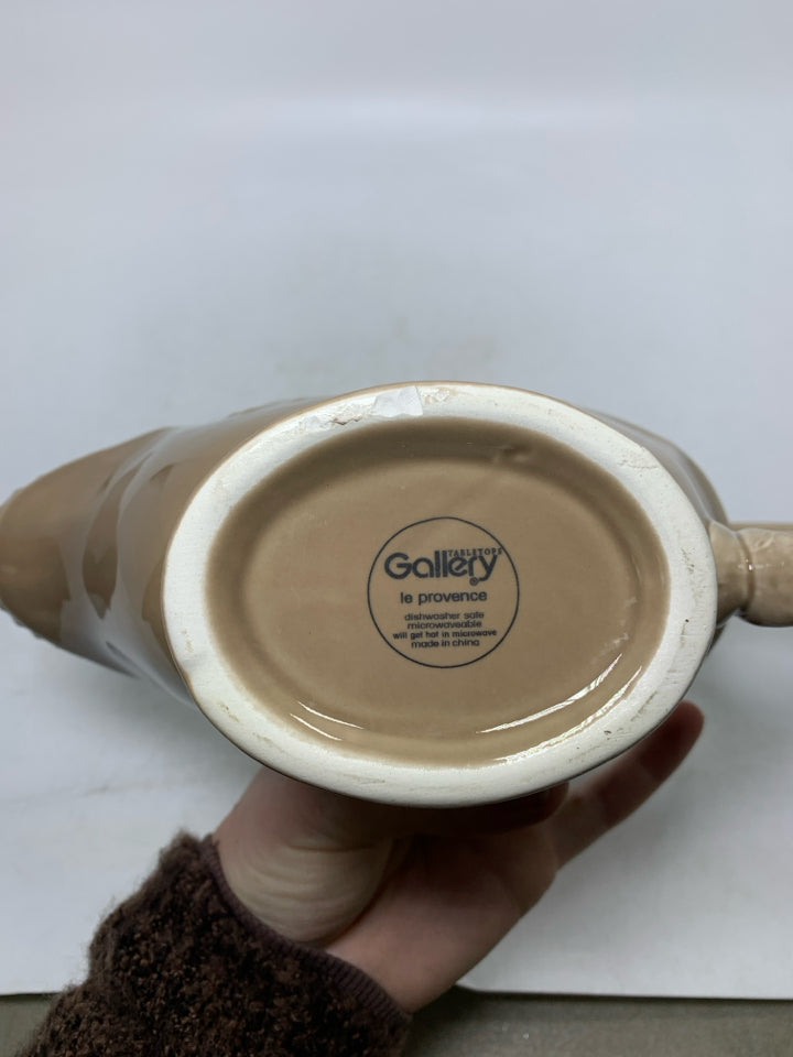 FOOTED GRAVY BOAT W/ BEADED EDGES.