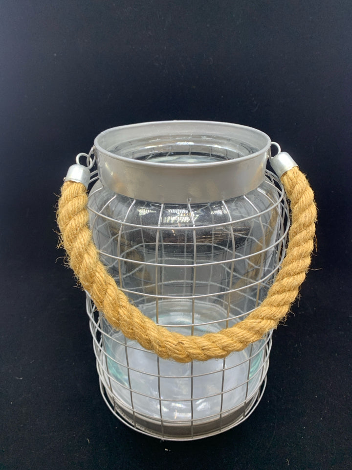 GLASS IN METAL CANDLE LANTERN W/BURLAP HANDLE.