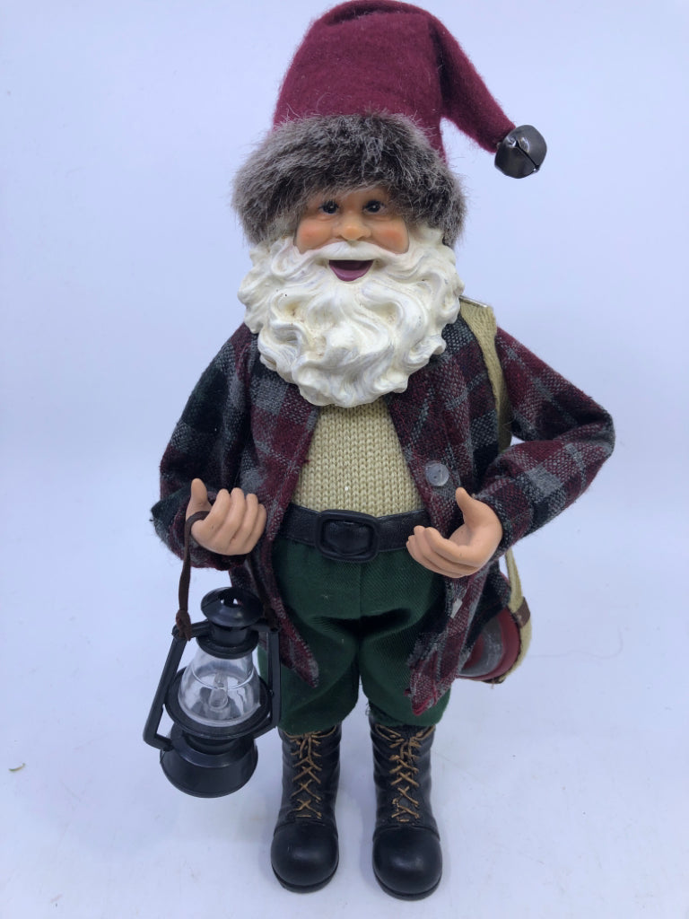 RESIN SANTA W/ PLAID FLANNEL HOLDING LANTERN.