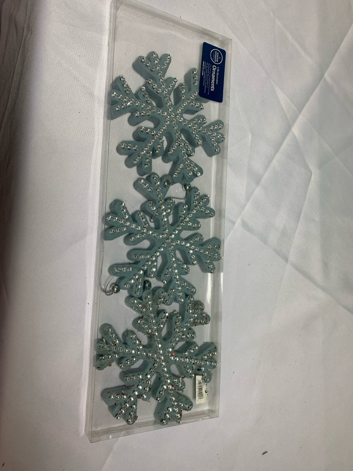 3 BLUE SNOWFLAKE ORNAMENTS.