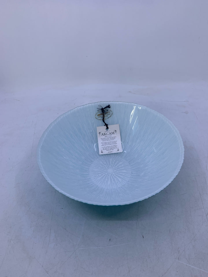BLUE OUTSIDE WHITE INSIDE GLASS BOWL.